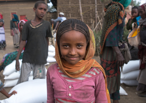 Ethiopian girl waits at a food distribution centre, Semien wollo zone, Woldia, Ethiopia