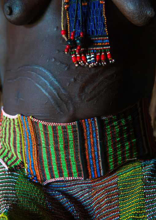 Toposa woman scarifications on the belly to indicate she is married, Omo valley, Kangate, Ethiopia