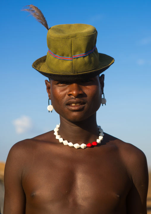 Dassanech man during dimi ceremony to celebrate circumcision of the teenagers, Omo valley, Omorate, Ethiopia