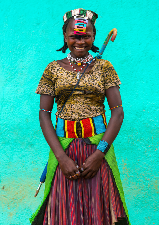 Portrait of a smiling bana woman with clips in the hair, Omo valley, Key afer, Ethiopia