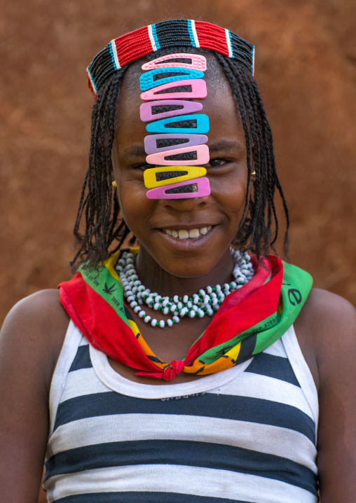Portrait of a bana tribe teenage girl with clips in the hair, Omo valley, Key afer, Ethiopia