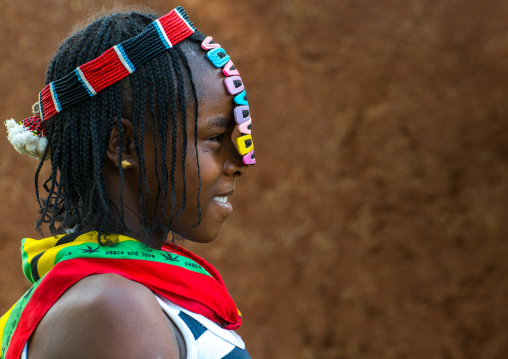 Profile of a bana tribe teenage girl with clips in the hair, Omo valley, Key afer, Ethiopia