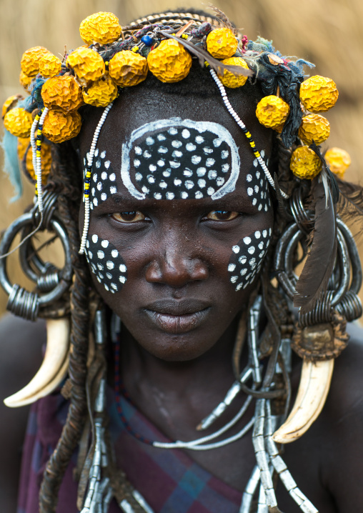 Mursi tribe woman with adornments and tribal make up, Omo valley, Mago park, Ethiopia