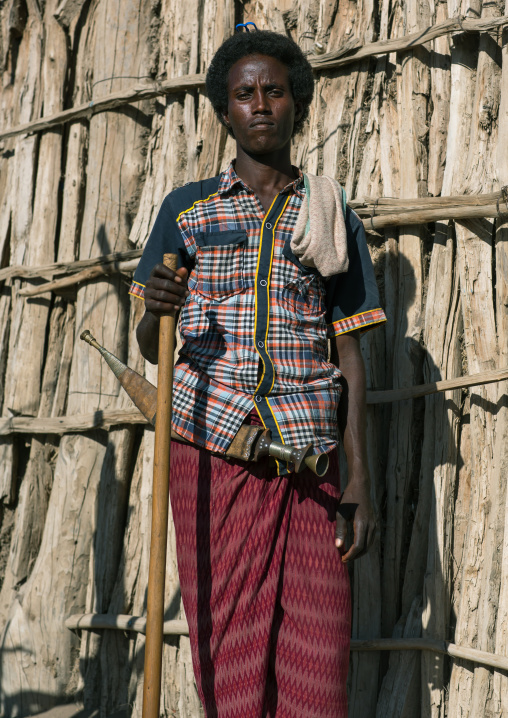 Portrait of an afar tribe man with his traditional knife, Afar region, Afambo, Ethiopia