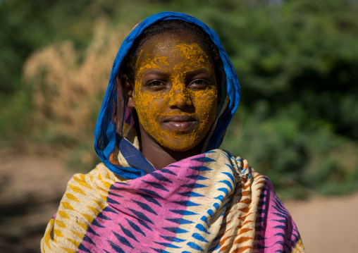 Portrait of an afar tribe teenage girl with qasil on her face, Afar region, Afambo, Ethiopia