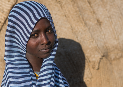 Portrait of an afar tribe teenage girl, Afar region, Afambo, Ethiopia