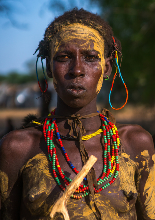 Portrait of a dassanech tribe woman during dimi ceremony, Omo valley, Omorate, Ethiopia
