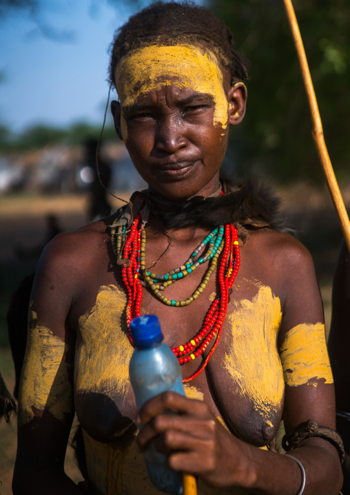Portrait of a dassanech tribe woman during dimi ceremony, Omo valley, Omorate, Ethiopia