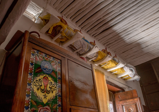 Rolled carpet above the main door to indicate a single girl is available for marriage, Harari region, Harar, Ethiopia
