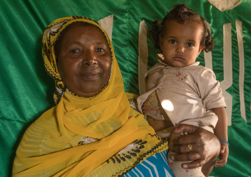 Sufi mother with her baby, Harari region, Harar, Ethiopia