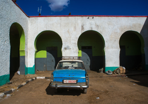 Peugeot 404 taxi in the market of the old town, Harari region, Harar, Ethiopia