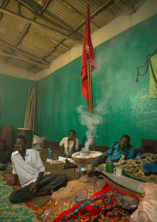 Men chewing during a sufi ceremony, Harari region, Harar, Ethiopia