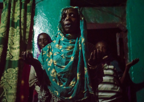 Sufi women go into a trance during a ceremony, Harari region, Harar, Ethiopia