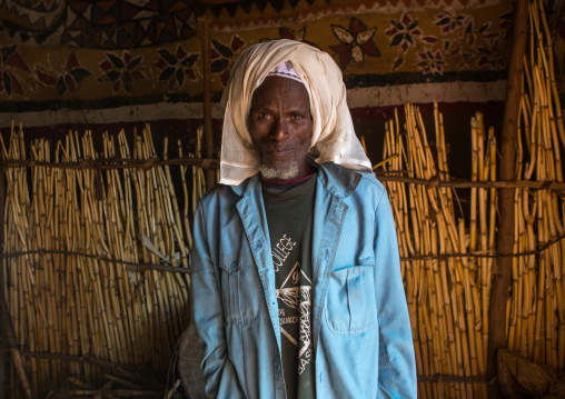 Ethiopian muslim man inside his traditional house, Kembata, Alaba kuito, Ethiopia