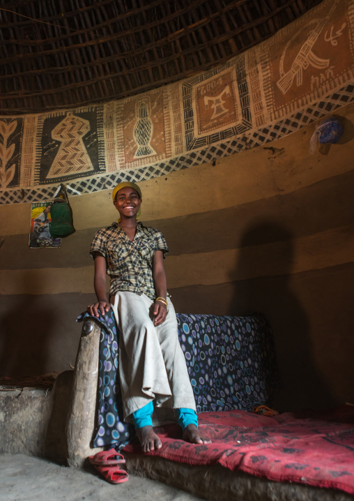 Ethiopia, Kembata, Alaba Kuito, ethiopian woman inside her traditional painted and decorated house