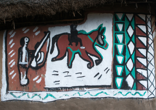 Ethiopia, Kembata, Alaba Kuito, man riding a horse on a painted house