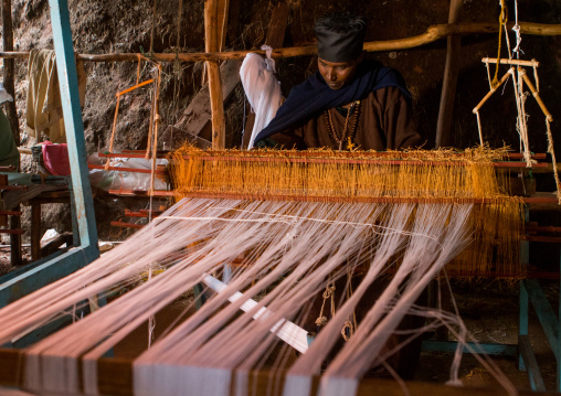 Orthodox monk weaver working, Amhara region, Lalibela, Ethiopia