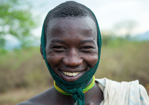 Portrait of a smiling bodi tribe man, Omo valley, Hana mursi, Ethiopia