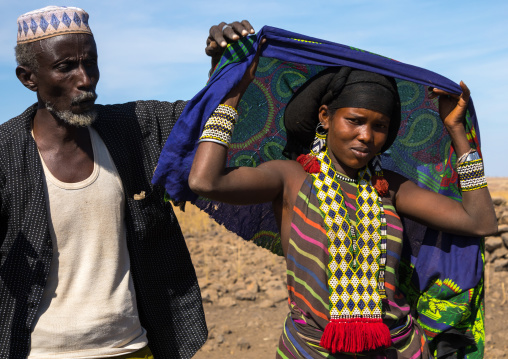 Issa tribe husband with his wife, Afar region, Yangudi Rassa National Park, Ethiopia