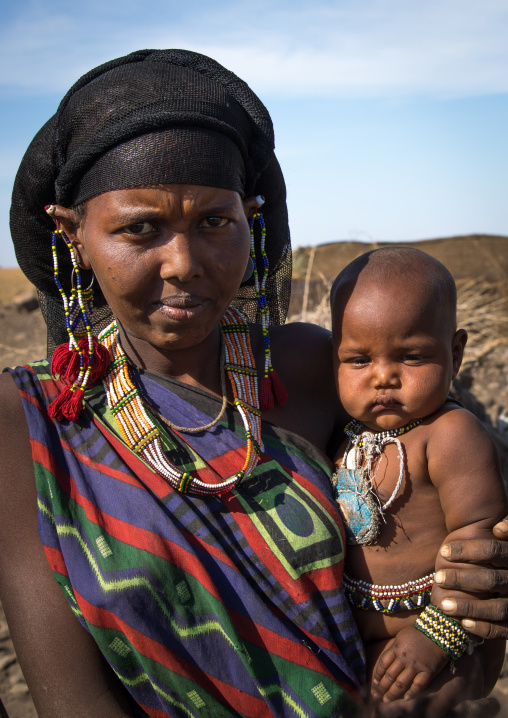 Issa tribe mother with her baby, Afar region, Yangudi Rassa National Park, Ethiopia
