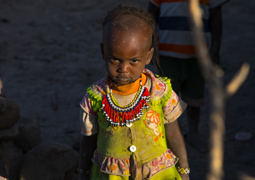 Afar tribe child girl with a beaded necklace, Afar region, Mile, Ethiopia