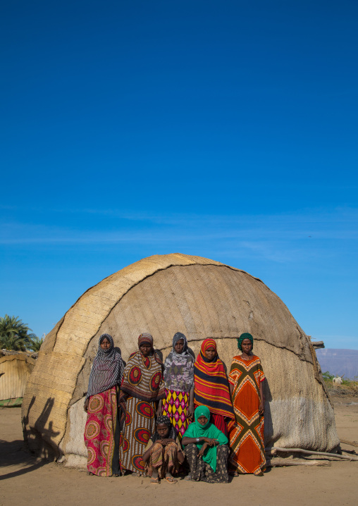 Portrait of Afar tribe women in front of their traditional hut, Afar region, Afambo, Ethiopia
