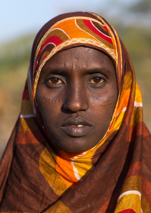 Afar tribe woman with scarifications on her face, Afar region, Afambo, Ethiopia