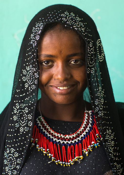 Portrait of an Afar tribe girl with braided hair and beaded necklace, Afar region, Semera, Ethiopia