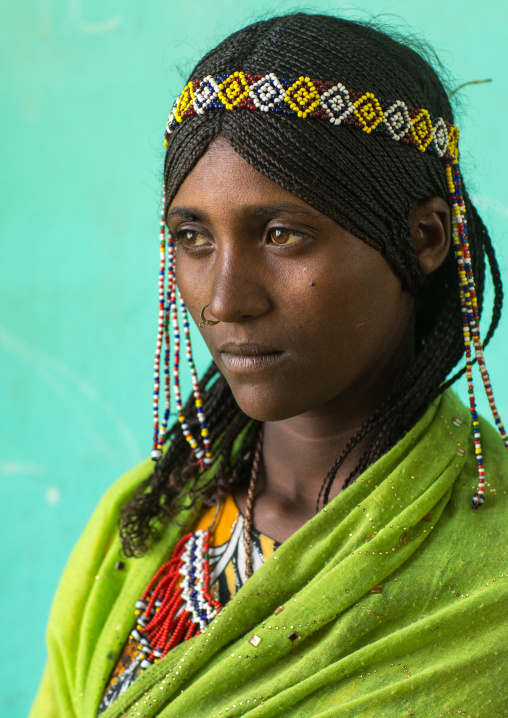 Portrait of an Afar tribe girl with braided hair and nose ring, Afar region, Semera, Ethiopia