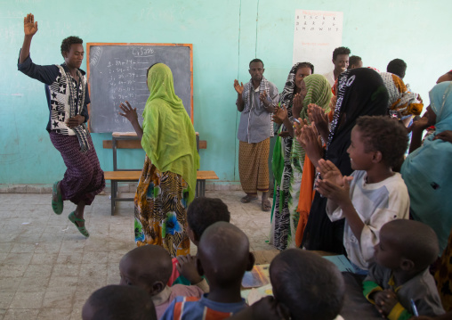 Afar tribe pupils dancing in their classroom, Afar region, Semera, Ethiopia