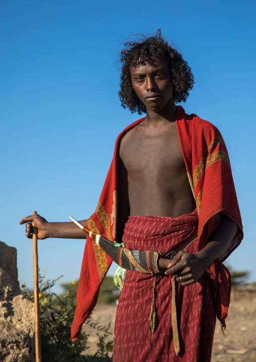 Portrait of an Afar tribe man with his guile knife, Afar region, Chifra, Ethiopia