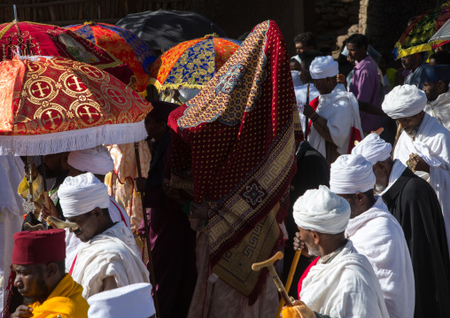 Ethiopian priest carrying a covered tabot on his head during Timkat epiphany festival, Amhara region, Lalibela, Ethiopia