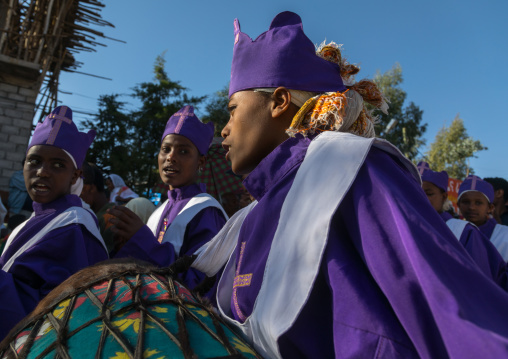 Ethiopian young women singing during Timkat epiphany festival, Amhara region, Lalibela, Ethiopia