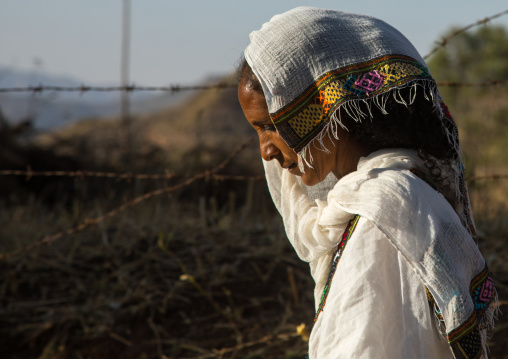 Ethiopian pilgrim woman during Timkat epiphany festival, Amhara region, Lalibela, Ethiopia