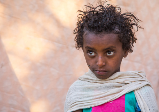 Young ethiopian girl during Timkat epiphany festival, Amhara region, Lalibela, Ethiopia
