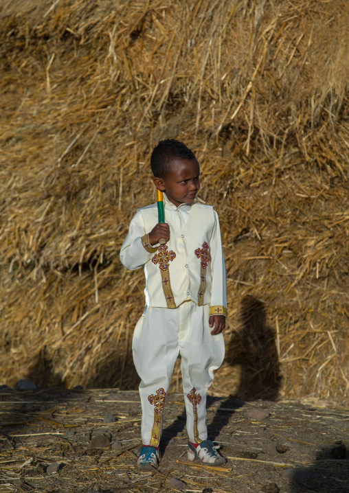 Ethiopian boy in traditional clothing during Timkat epiphany festival, Amhara region, Lalibela, Ethiopia
