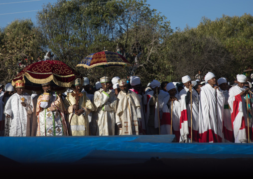 Priests in front of the pool during Timkat celebrations of epiphany, Amhara region, Lalibela, Ethiopia