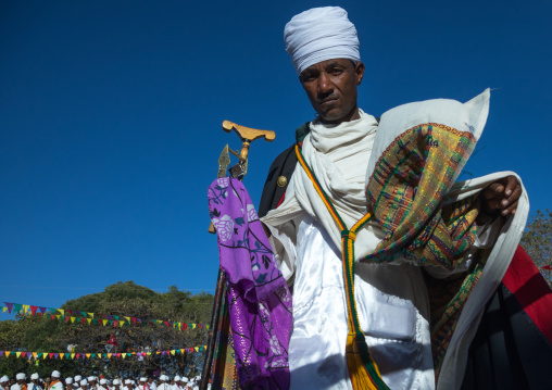 Ethiopian orthodox priest celebrating the colorful Timkat epiphany festival, Amhara region, Lalibela, Ethiopia