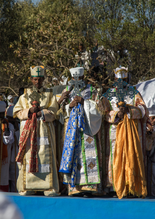 Priests in front of the pool blessing the holy water during Timkat celebrations of epiphany, Amhara region, Lalibela, Ethiopia