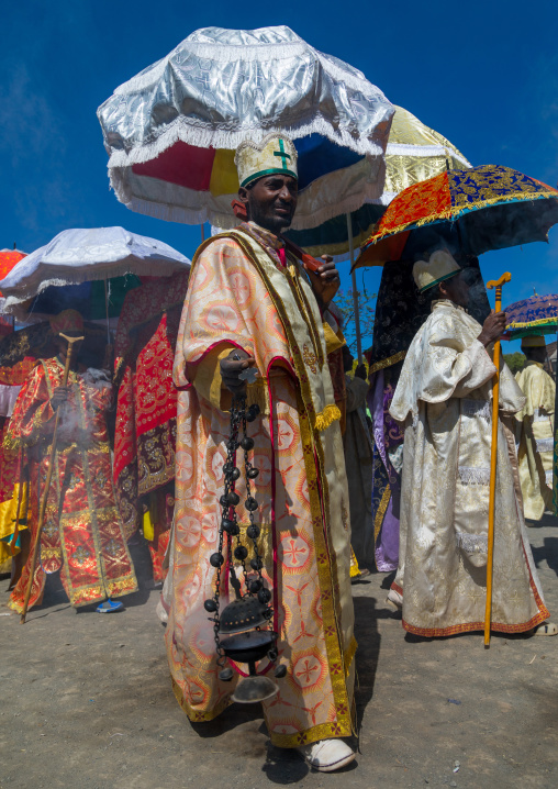 Ethiopian orthodox priests with censers celebrating the colorful Timkat epiphany festival, Amhara region, Lalibela, Ethiopia