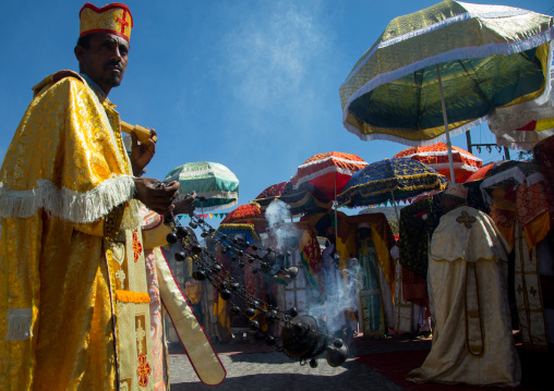 Ethiopian orthodox priests with censers celebrating the colorful Timkat epiphany festival, Amhara region, Lalibela, Ethiopia