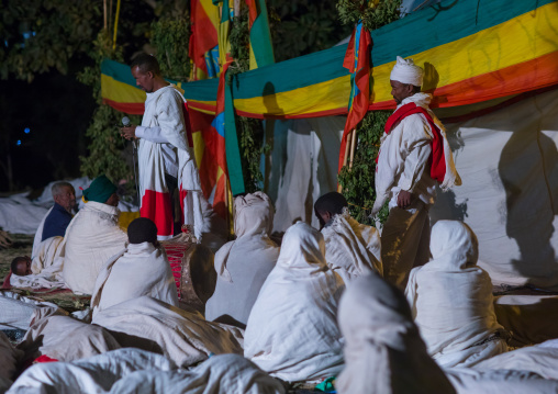 Orthodox pilgrims at Timkat festival during nightime, Amhara region, Lalibela, Ethiopia