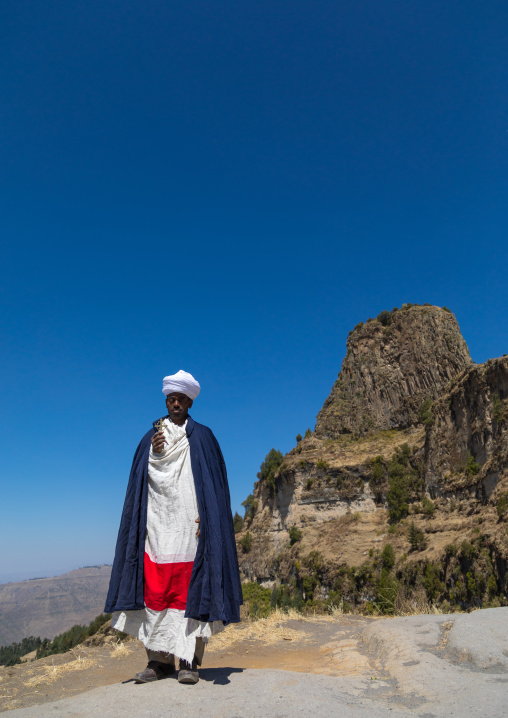 Priest of the ethiopian orthodox church in Asheten mariam rock hewn church, Amhara region, Lalibela, Ethiopia