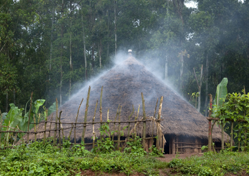 Smoke coming out of a traditional house, Ethiopia