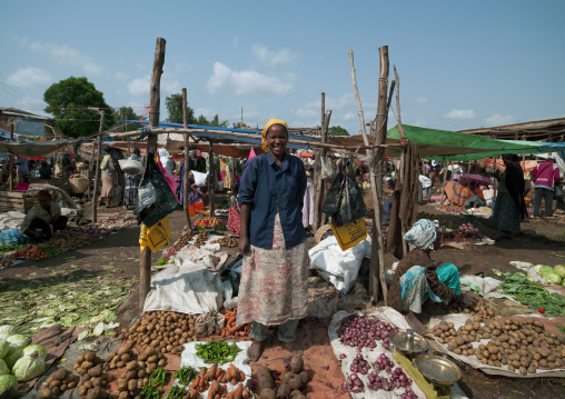 Woman smiliing in mojo market, Ethiopia