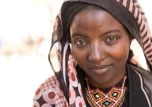 Portrait of a smiling Borana tribe young woman, Oromia, Yabelo, Ethiopia