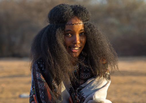 Portrait of a smiling Borana tribe woman during the Gada system ceremony in Borana tribe, Oromia, Yabelo, Ethiopia
