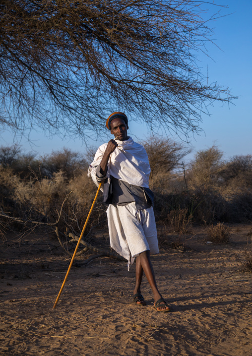 Portrait of a Borana man with his stick during the Gada system ceremony, Oromia, Yabelo, Ethiopia