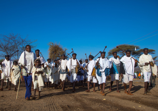 Borana tribe men with their ororo sticks during the Gada system ceremony, Oromia, Yabelo, Ethiopia