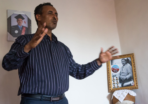 Pastor Mohamed Ousman Salih who converted from islam to christianity praying in his home, Addis Ababa region, Addis Ababa, Ethiopia